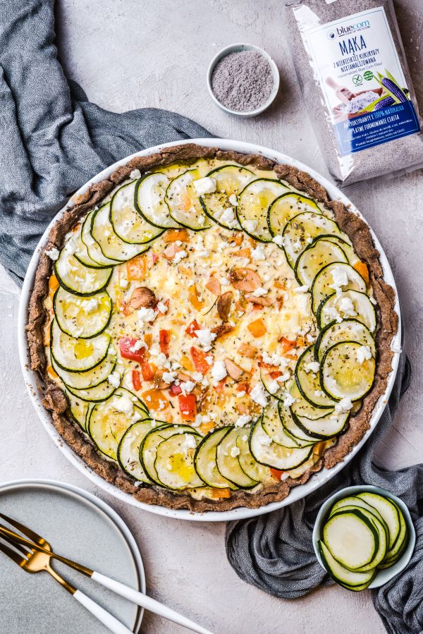 Gluten-free tart with zucchini and feta cheese with blue corn flour